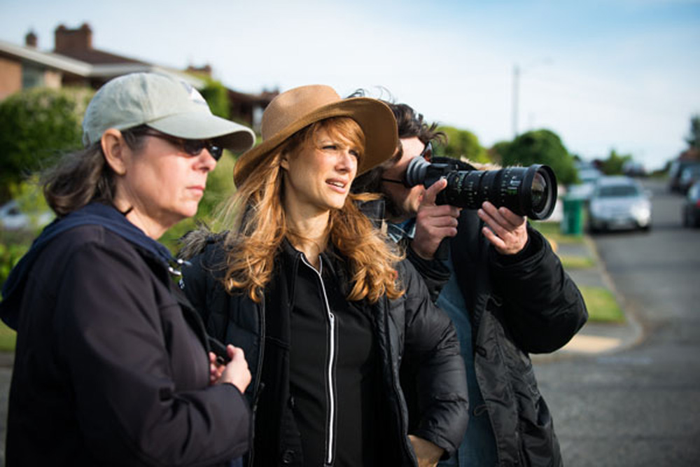 Seattle-based Director Lynn Shelton on set during the filming of "Laggies." To the right of Lynn is director of photography Ben Kasulke. 